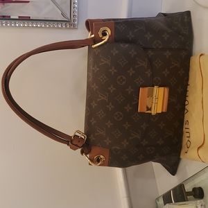 Louis Vuitton Monogram Olympe bag